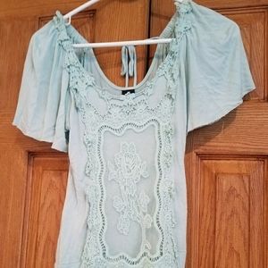 Dainty mint green ladies shirt with lace accents